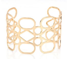 Brede open bangle armband - goudkleurig