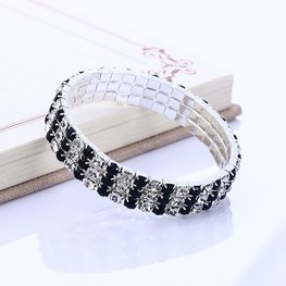 Armband 3 rijen strass - zwart/blank