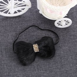 Elastische haarband bont strik - zwart